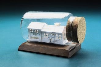 gift for real estate agents - house sculpture made from business cards